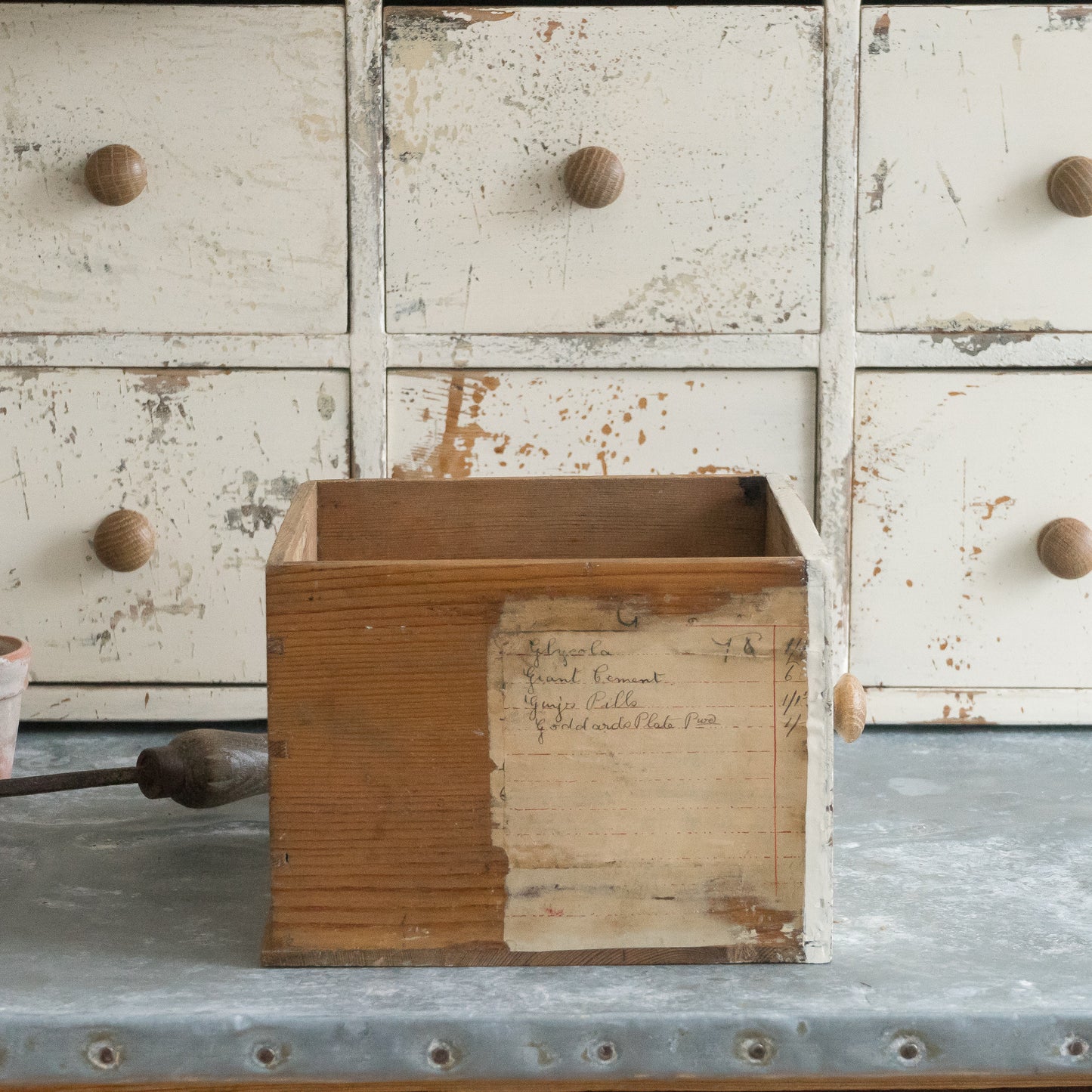 Rustic Bank of Painted Drawers
