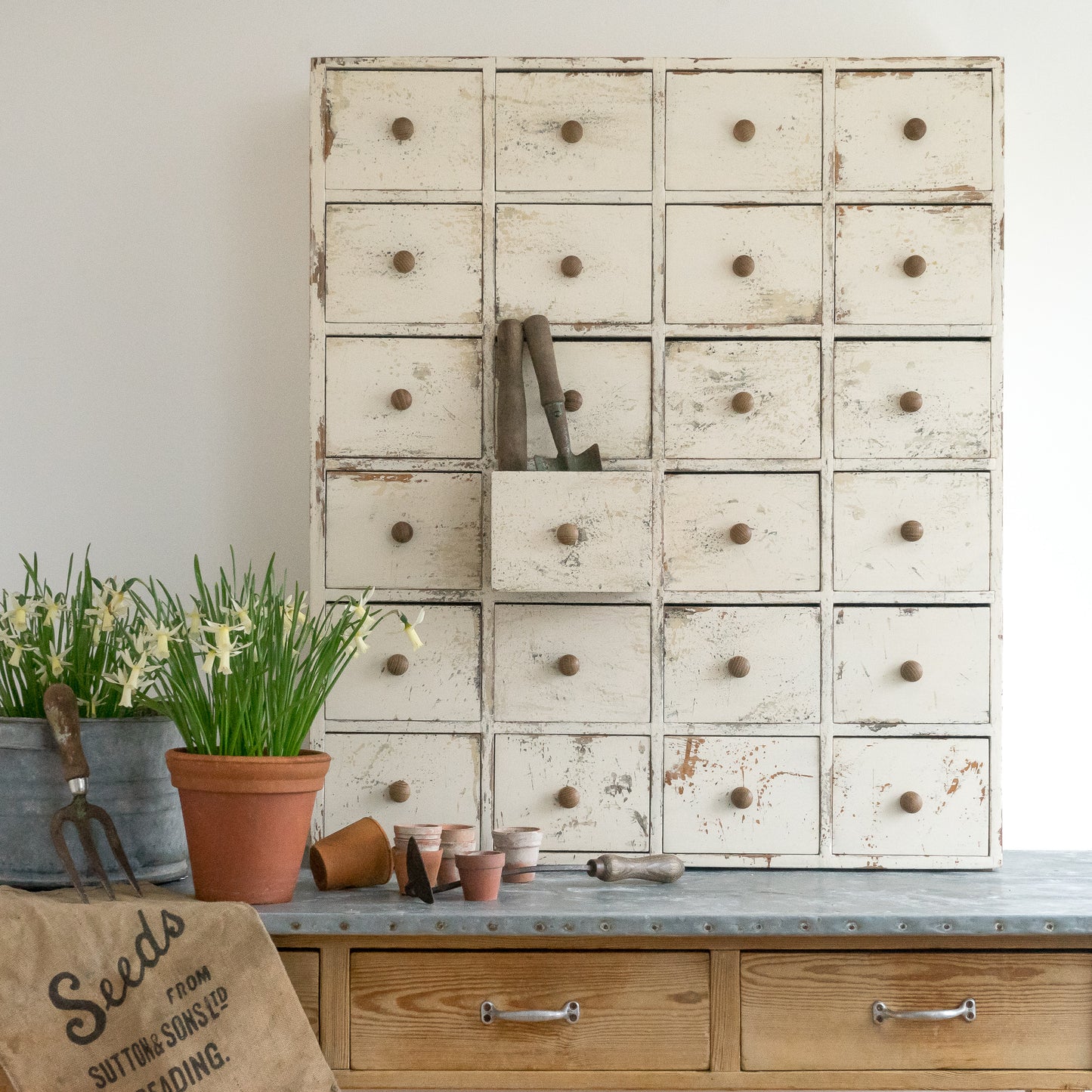 Rustic Bank of Painted Drawers