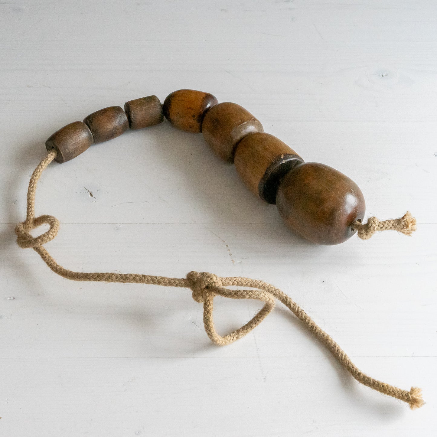 Rustic String of Wooden Plumbers Bobbins