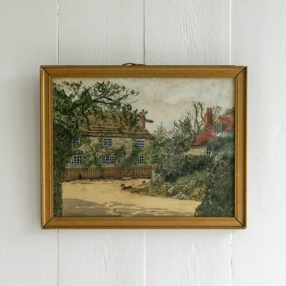 Framed Watercolour Painting of a Dog outside a Cottage