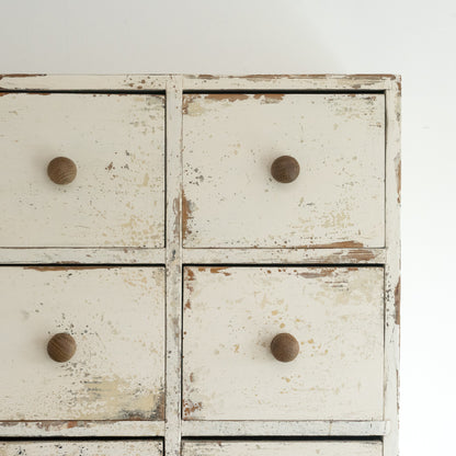 Rustic Bank of Painted Drawers