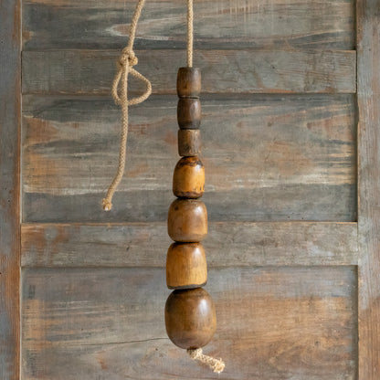Rustic String of Wooden Plumbers Bobbins