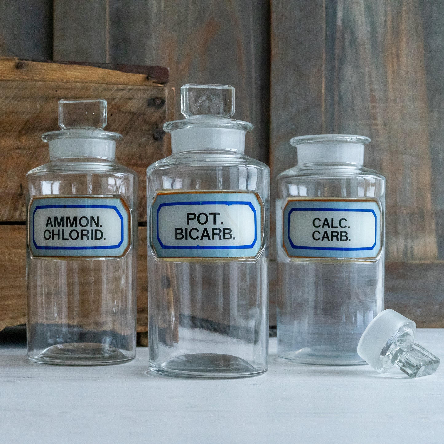 Vintage Glass Chemistry Bottles with Blue and White Labels
